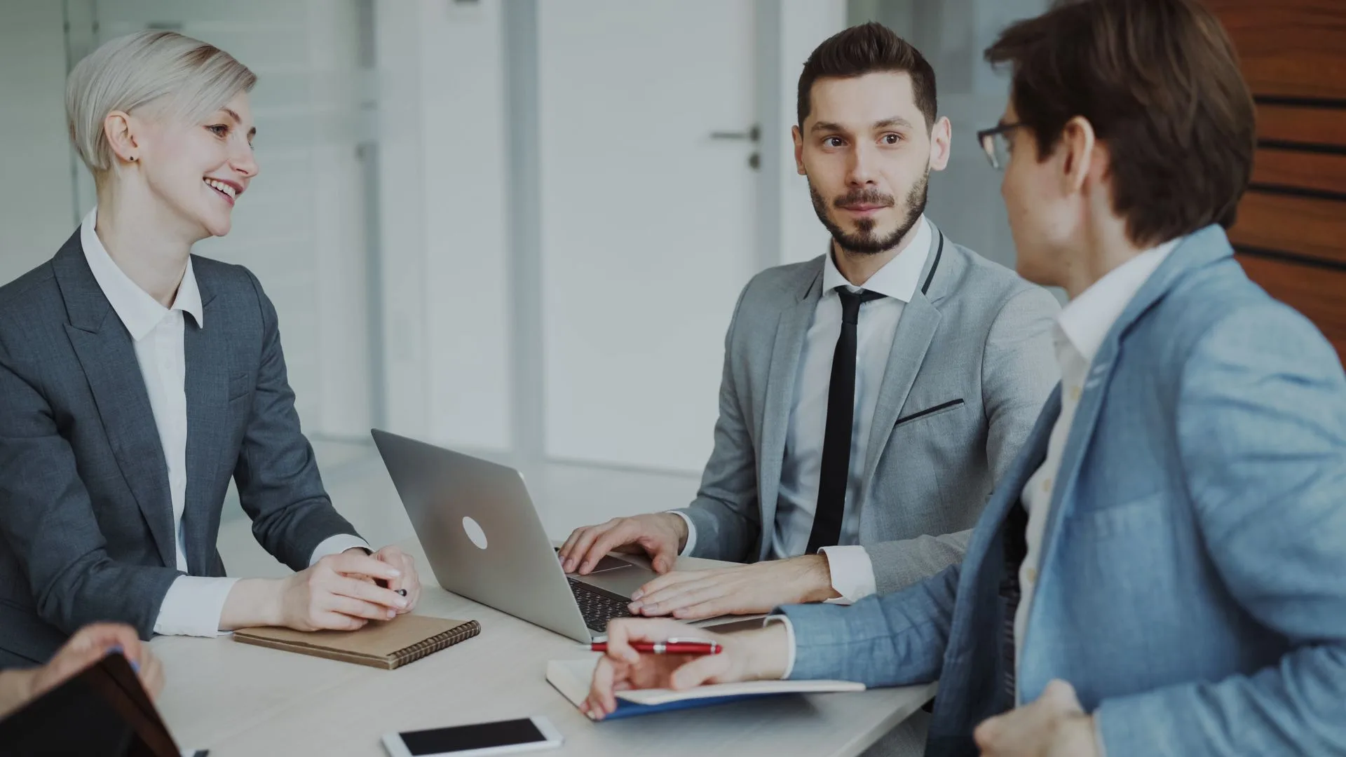 Professionals in a corporate training consultation